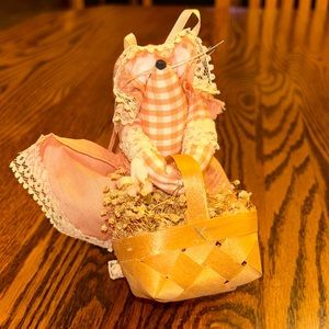 Hand-made stuffed country mouse shelf sitter with basket of dried flowers.